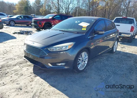 2015 Ford Focus Titanium from USA, damaged, VIN 1FADP3N23FL218472